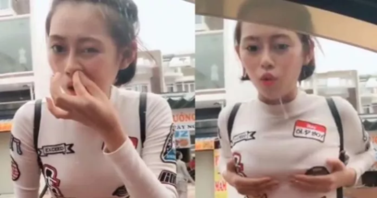 Babae napatakbo matapos manalamin sa tinted window ng isang kotse sa Vietnam